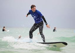 Sean surfing off Bondi Beach
