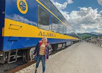 April next to the Denali Star train, Alaska