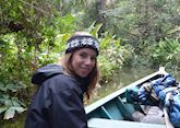 Stella taking a boat trip in the Amazon, Peru