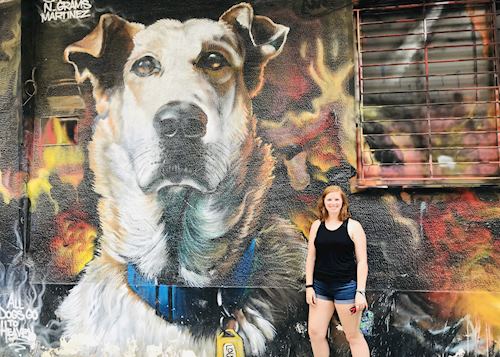 Abby on a street art tour of Athens