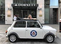 Amelia on a Mini Cooper tour of London