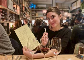 Gudrun preparing to order a local Italian dish