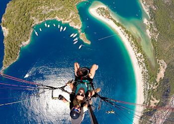 Lara paragliding over the Blue Lagoon, Ölüdeniz, Turkey