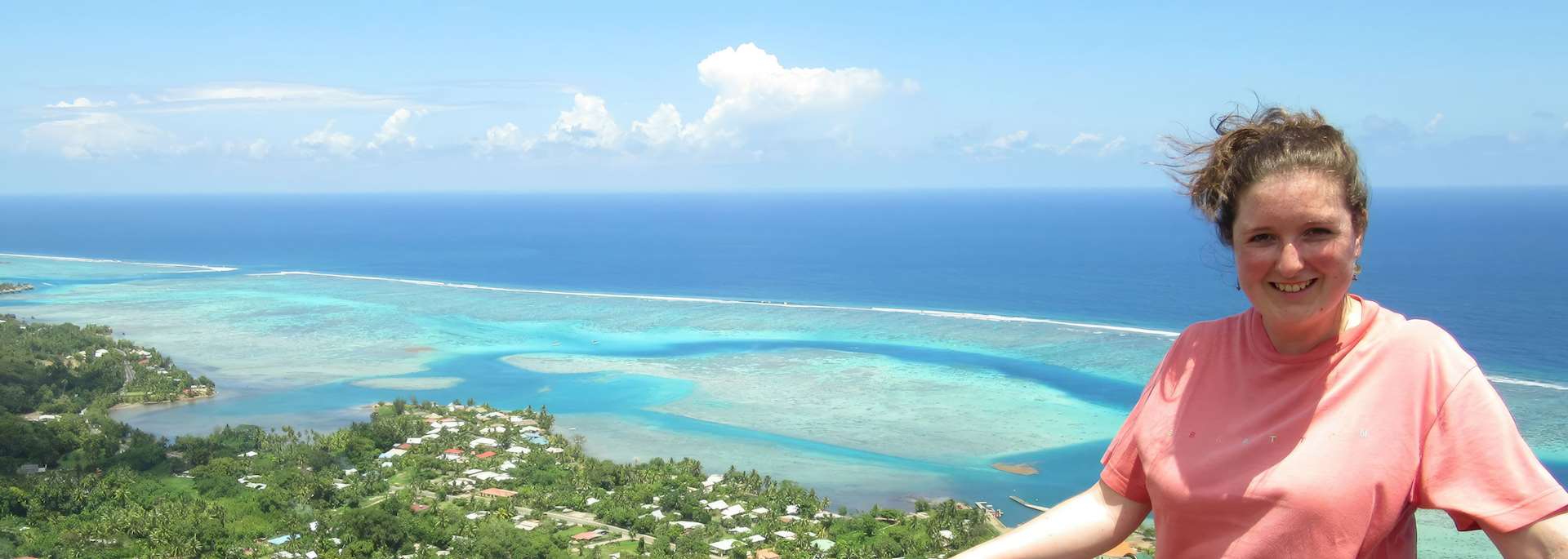 Annabel on top of Magic Mountain looking at the lagoons of Moorea, French Polynesia