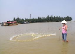 Hannah fishing in Vietnam