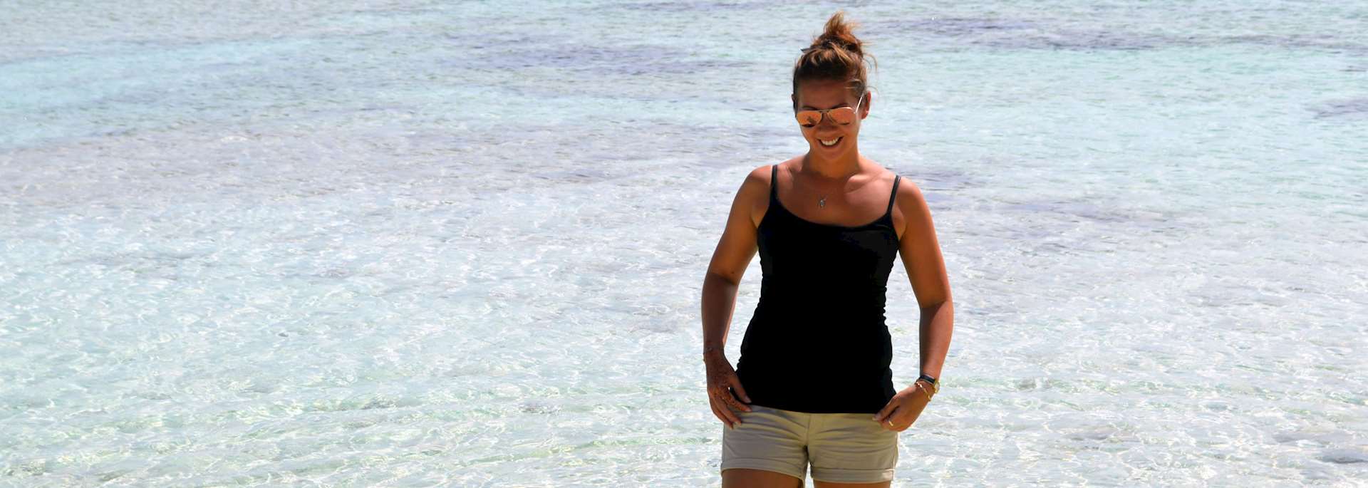 Hannah paddling on Dennis Island, Seychelles