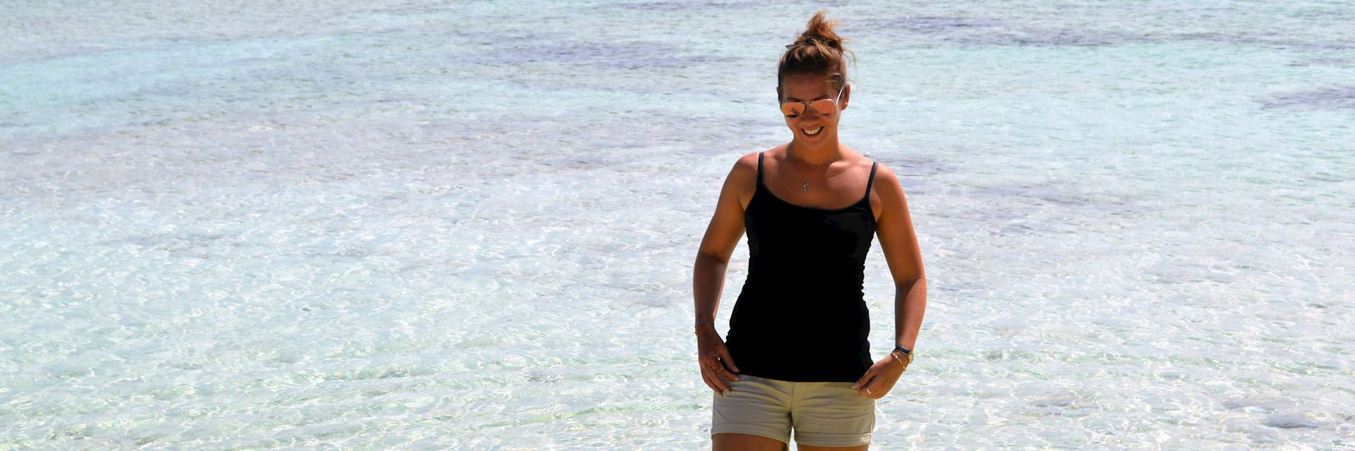 Hannah paddling on Dennis Island, Seychelles