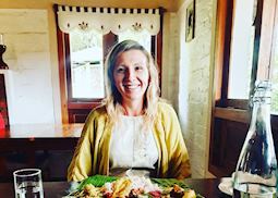 Amber trying a local dish in India