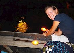 Carol setting off prayer offerings along the Ganges, India