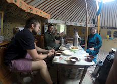 Matt with a local family in a traditional ger in Mongolia