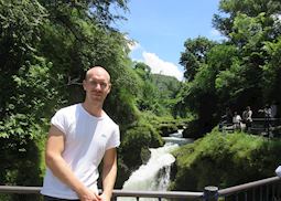 Niall relaxing after a trek at Devils Falls Pokhara, Nepal