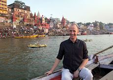 Nick floating down the Ganges in Varanasi, India