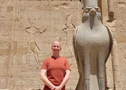 Nick with the statue of Horus, Edfu, Egypt