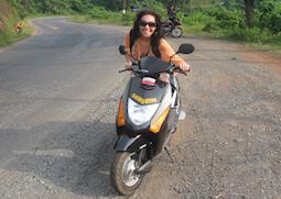 Sophie trying a local scooter, India