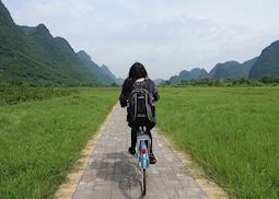 Sophie cycling in Yangshuo, China