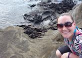 Caroline with iguanas in the Galapagos Islands