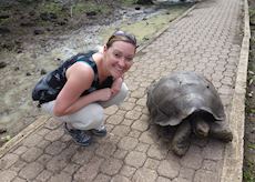 Caroline with a giant tortoise in the Galapagos Islands
