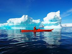 Nik sea kayaking in Antarctica