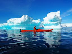 Nik sea kayaking in Antarctica