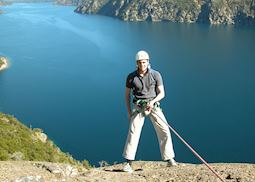Tom abseiling over Lake Nahuel Huapi, Bariloche, Argentina