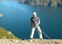 Tom abseiling over Lake Nahuel Huapi, Bariloche, Argentina