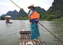 Robin on Yulong River, China