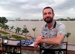 Alex at the Foreign Correspondents Club in Phnom Penh, Cambodia