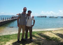 Alex saying goodbye to his guide in Halong Bay, Vietnam