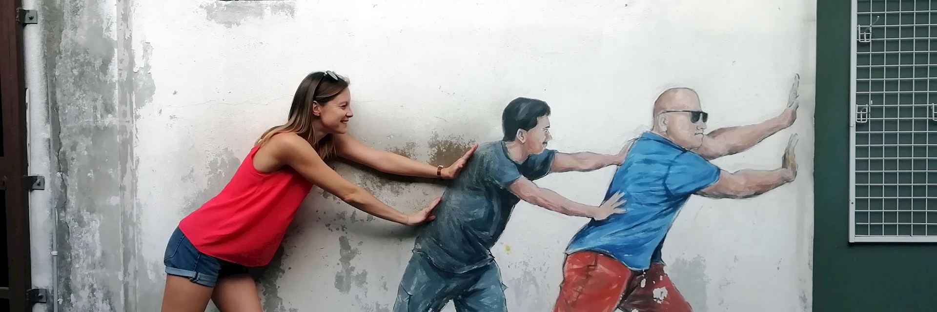 Charlotte on a Penang street in Malaysia