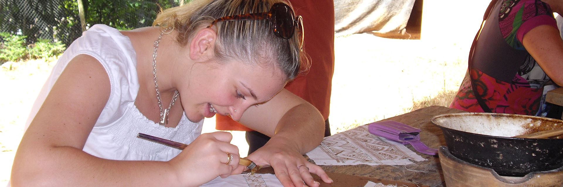 Charlotte making a traditional Hmong batik handkerchief, Thailand
