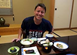 David eating traditional Kaiseki food in a Japanese ryokan