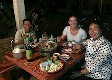 Hayley with a local family in Champasak, Laos