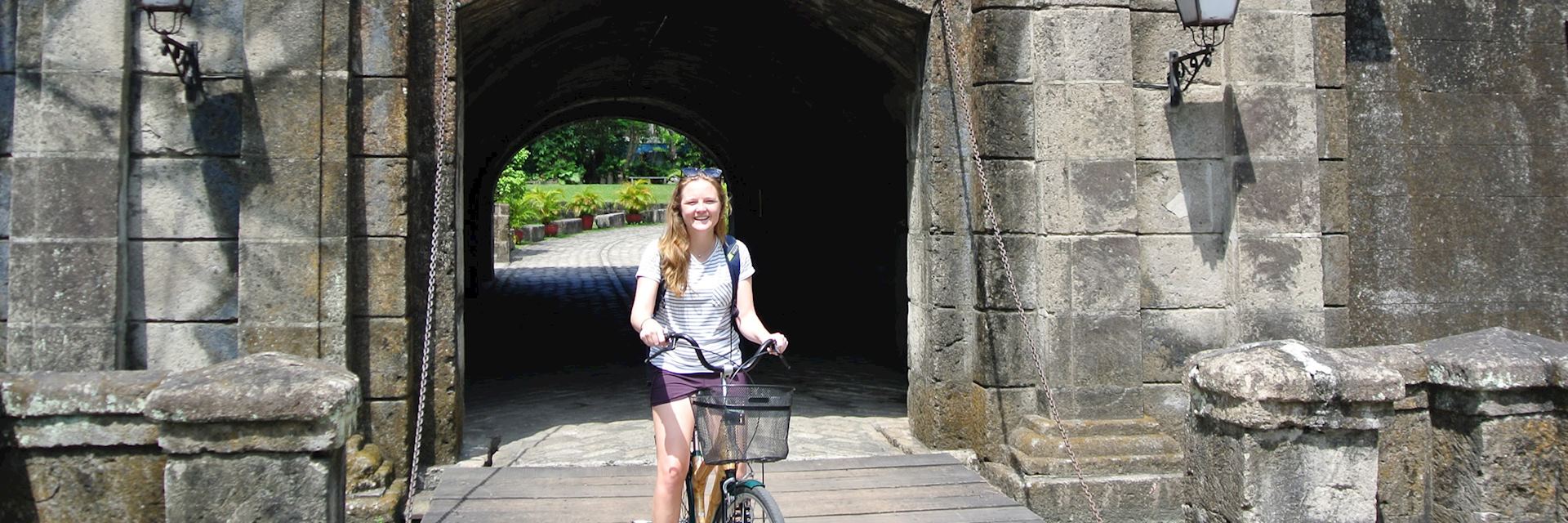 Isabel riding through Intramuros, Manila