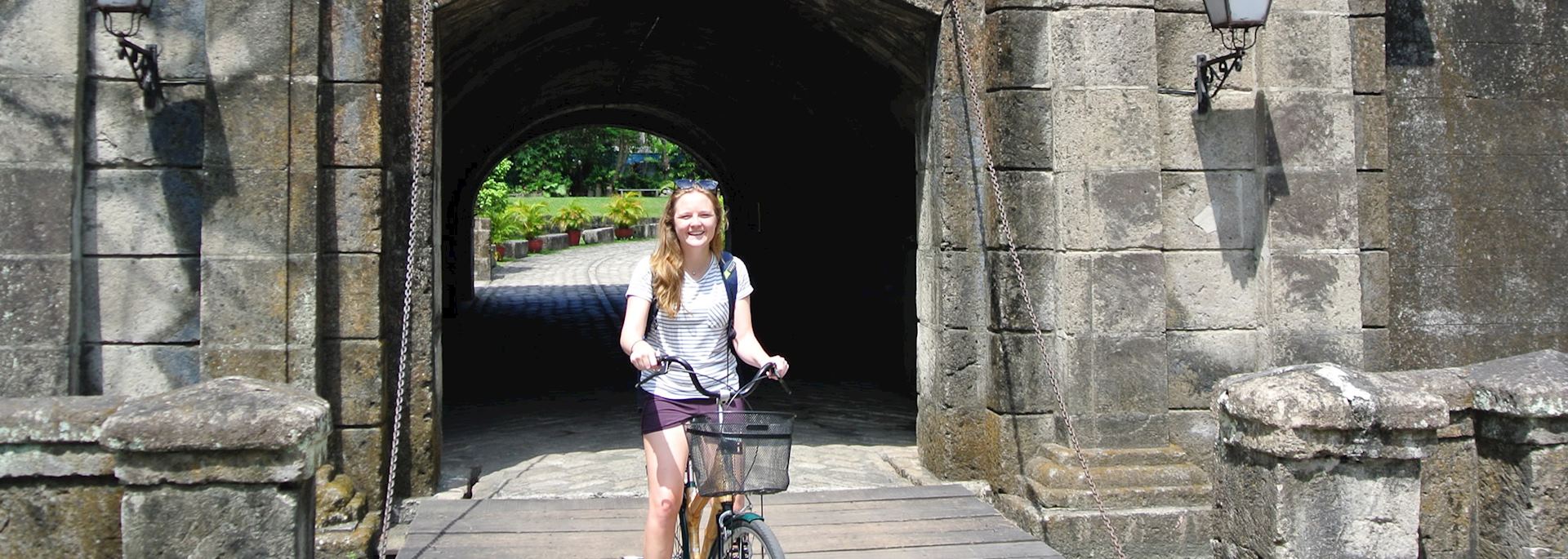 Isabel riding through Intramuros, Manila