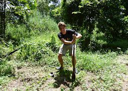 Rob planting a tree next to the Kinabatangan River, Borneo
