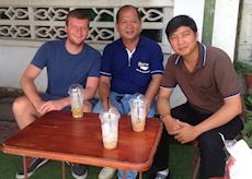 Ross in a coffee shop in Phnom Penh, Cambodia