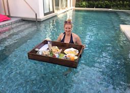 Tesia enjoying a floating breakfast at the Santiburi Koh Samui, Thailand