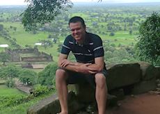 William and the panoramic view at Wat Phou in Southern Laos