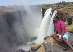 David looking over the edge of Victoria Falls