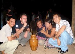 Jack with a local family in the Central Highlands of Vietnam
