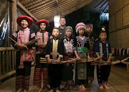 Matt with the Hmong and Lahu tribal dancers at the Lanjia Lodge in the hills of the Golden Triangle, Thailand