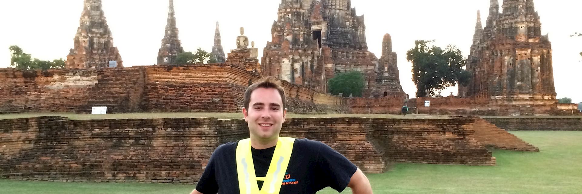 Matt on a bicycle excursion stops off at one of the ancient temples in Ayutthaya, Thailand