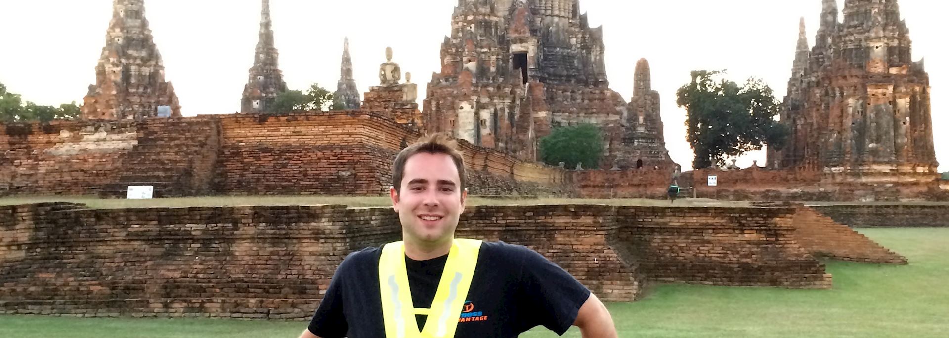 Matt on a bicycle excursion stops off at one of the ancient temples in Ayutthaya, Thailand