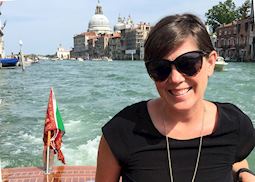Shannon on a boat ride along the canal in Italy