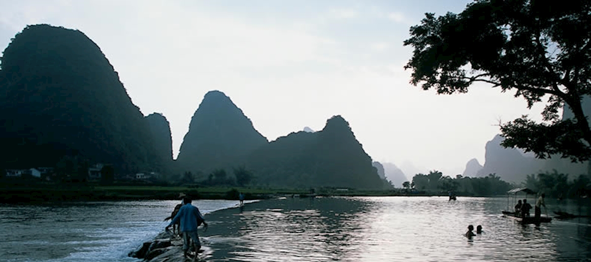 Enjoying the river, Yangshuo. Enjoying the river, Yangshuo.