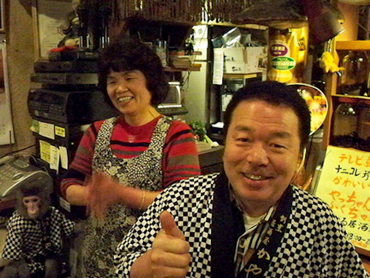 One of the monkeys and owner Otsuka at Izakaya Kayabuki