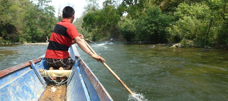 A long-tail boat journey, the starting point of a night safari in Nam Et-Phou Louey National Park