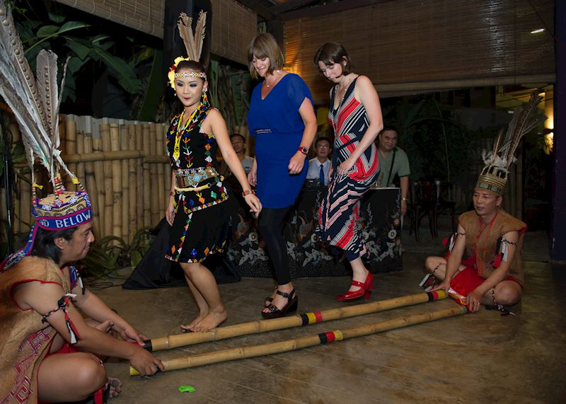 Audley's Southeast Asia Programme Manager Natalie (right) and North Asia and Arabia Programme Manager Vicky, mastering the basics of the traditional dance of Sarawak in Borneo